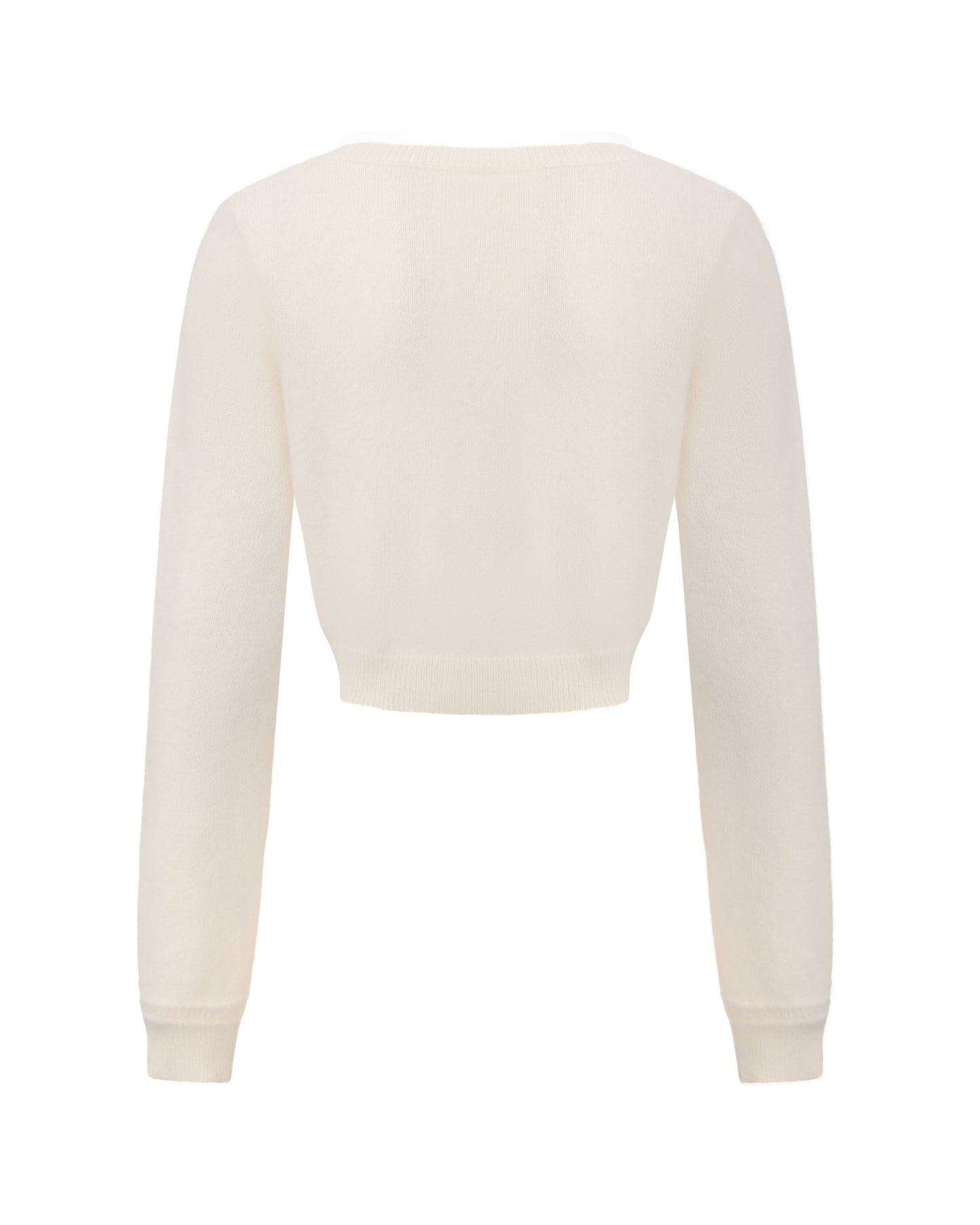 Retro-style white knitted cardigan on white background