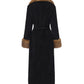 Black long coat with brown faux fur-trimmed collar on a white background