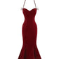 Red velvet evening gown on a white background