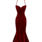 Red velvet evening gown on a white background