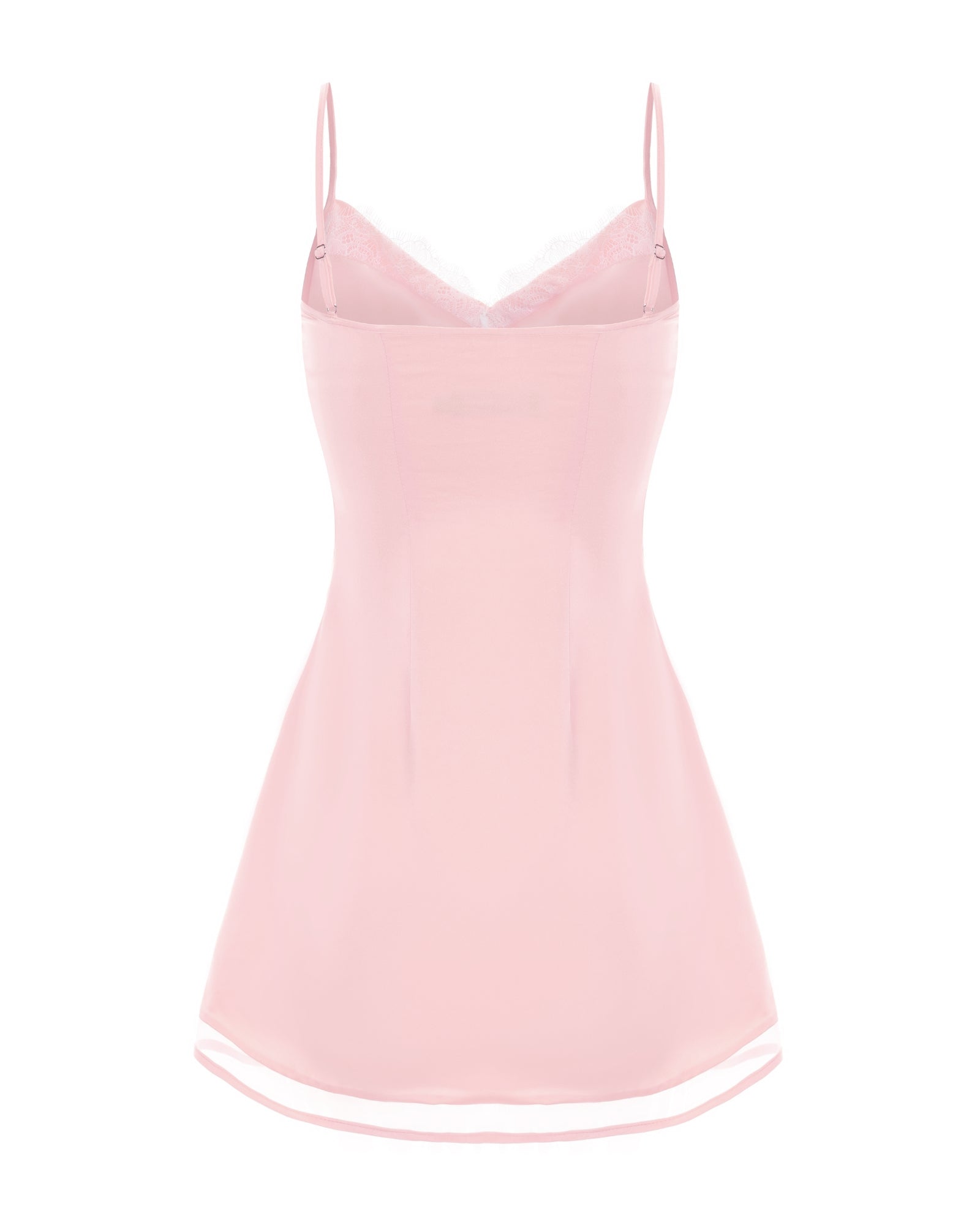 Pink slip dress with thin straps on a white background