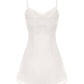 White satin slip mini dress on a white background