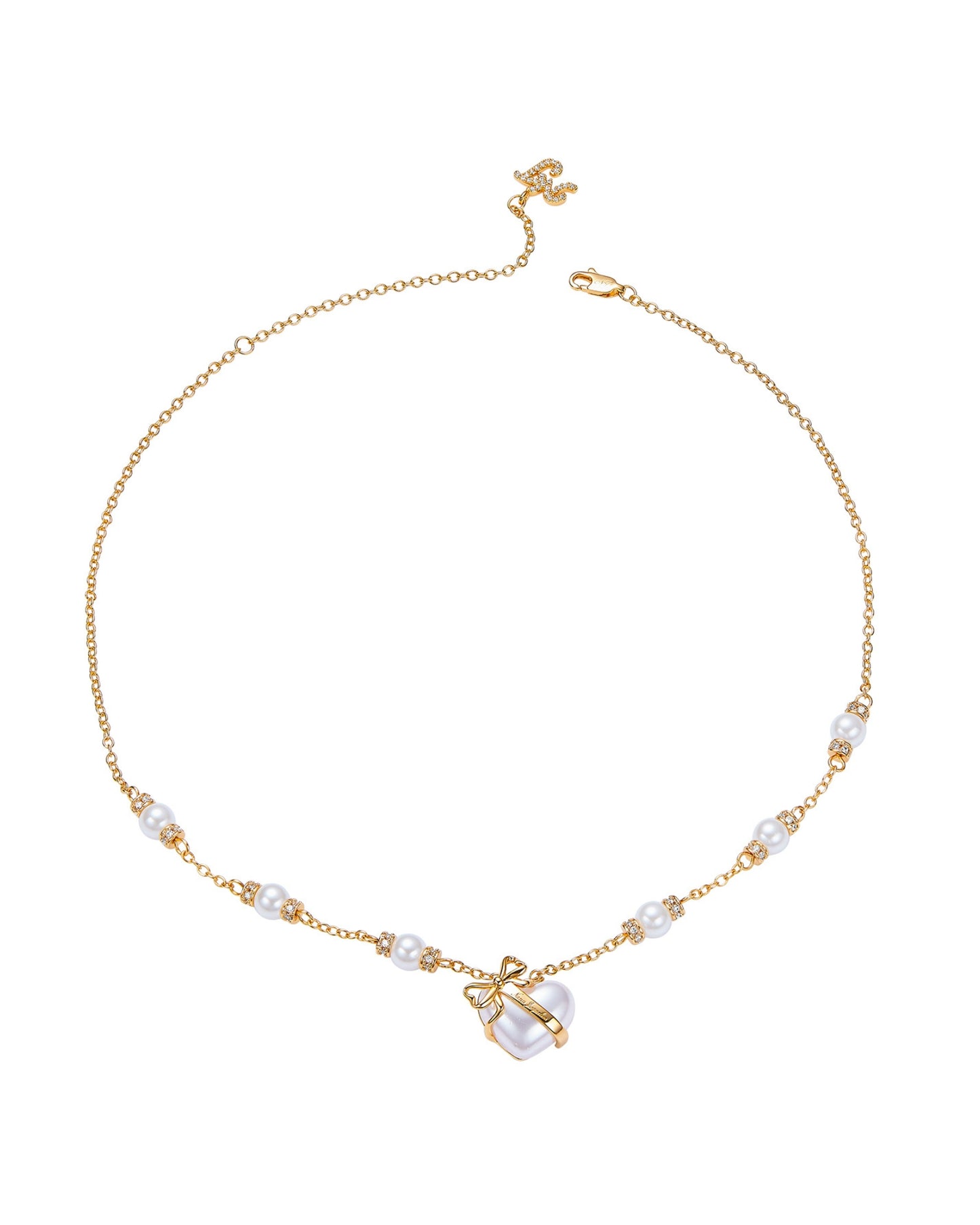 Gold necklace with pearl accents on a white background