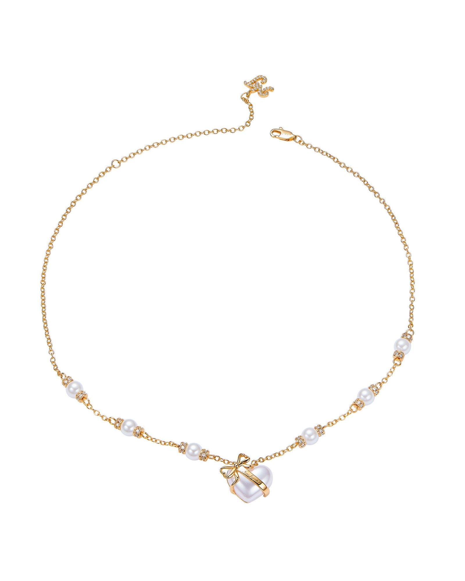 Gold necklace with pearl accents on a white background