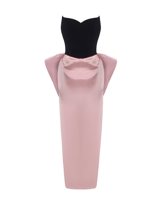 Pink and black velvet and satin maxi dress with a large bow on the back on a white background