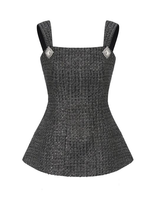 Black tailored textured top with thick straps on a white background