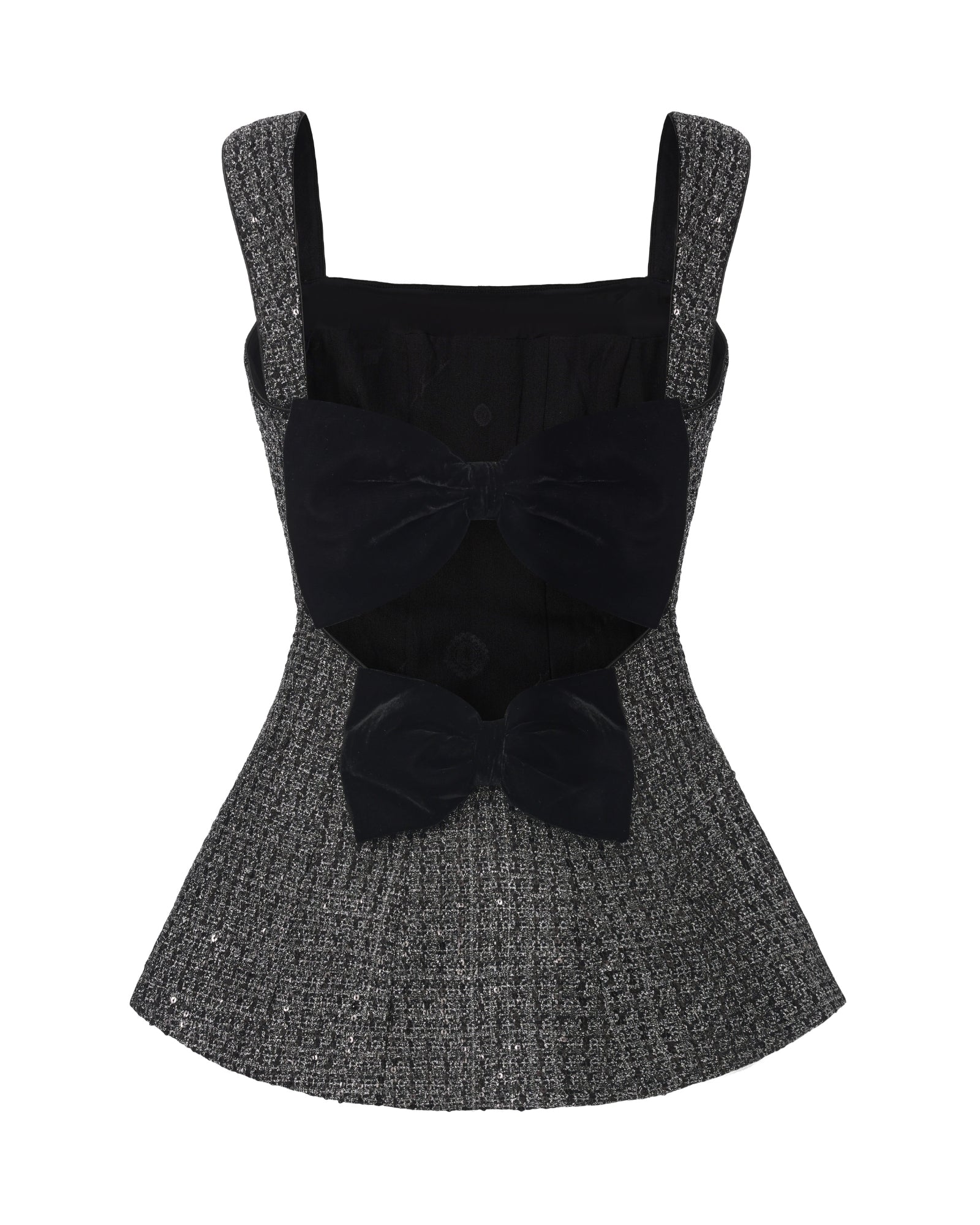 Black top with a large bow on a white background