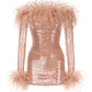 Sequin mini dress with feathered shoulders and sleeves on a white background