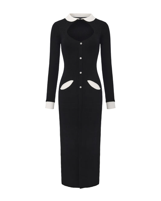 Black knit maxi dress with white collar, cuffs, and pocket trim
