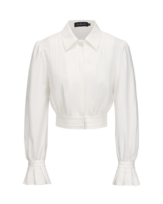 White blouse with long sleeves on a white background