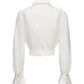 White blouse with long sleeves on a white background