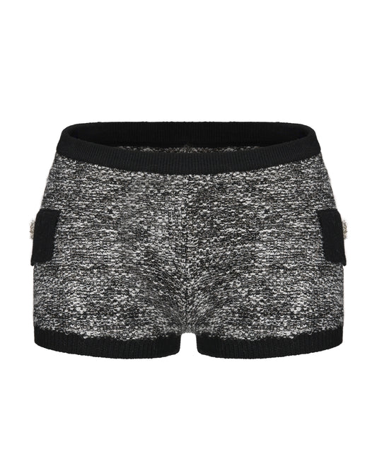 Black and white silver shorts with black trim on a white background