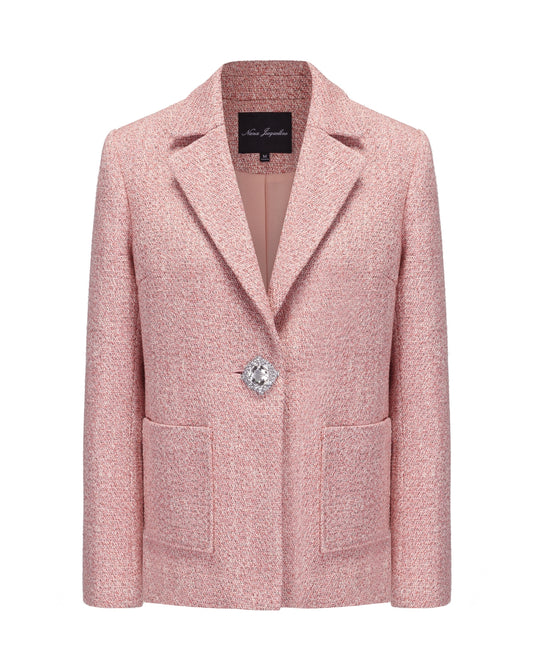 Pink suit jacket with a diamond button on a white background