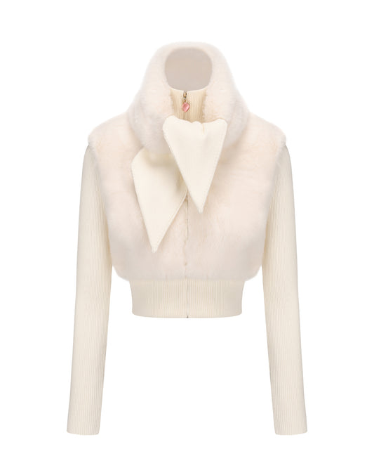 White knit jacket with a high collar on a white background