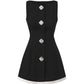 Black sleeveless mini dress with decorative buttons on a white background