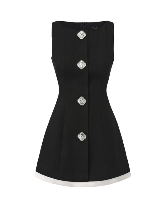 Black sleeveless mini dress with decorative buttons on a white background