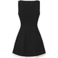Black sleeveless mini dress with white trim on a white background