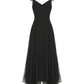 Black evening gown with thin straps on a white background