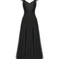 Black evening gown with thin straps on a white background