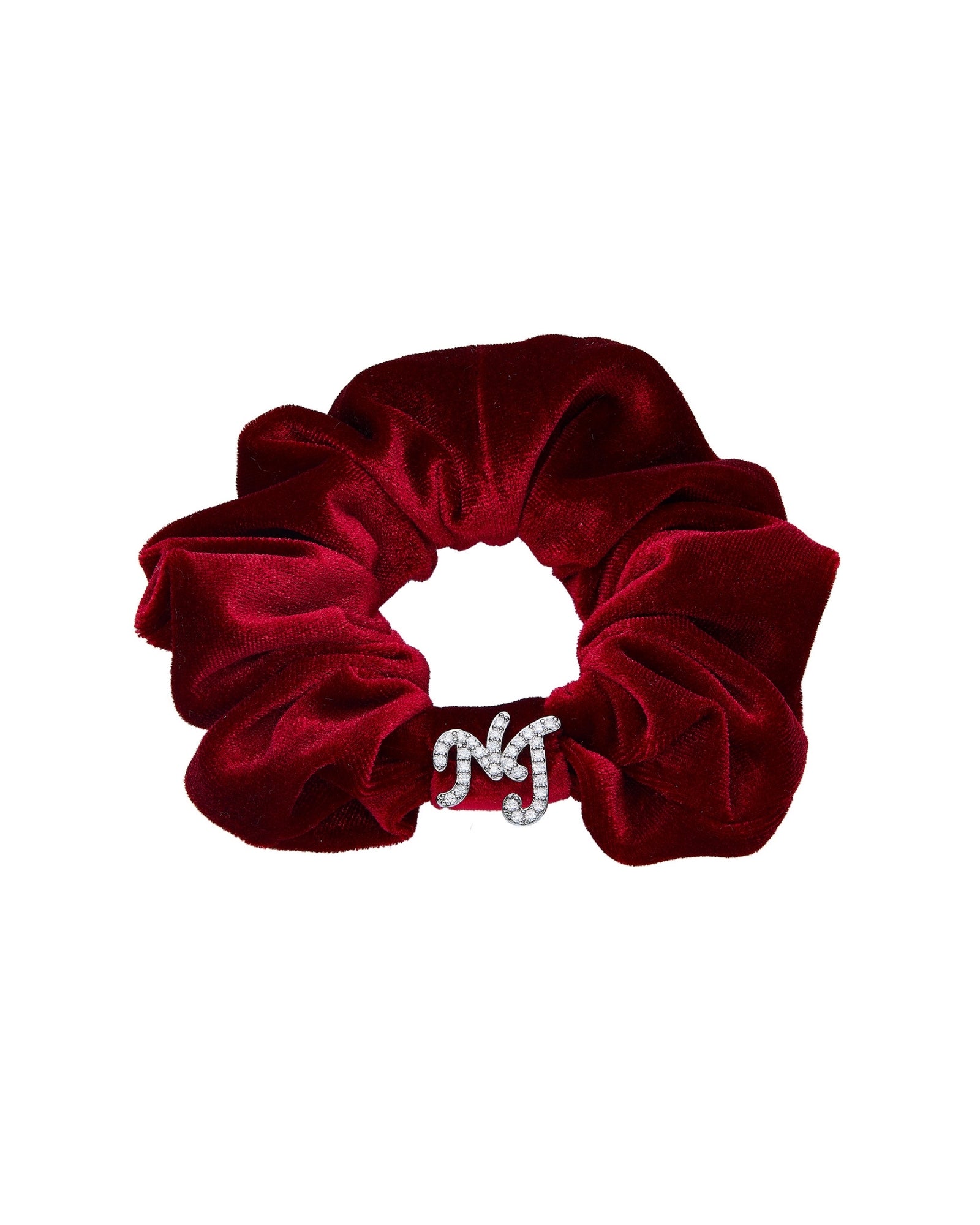 Red velvet scrunchie with a silver NJ letters on front on a white background