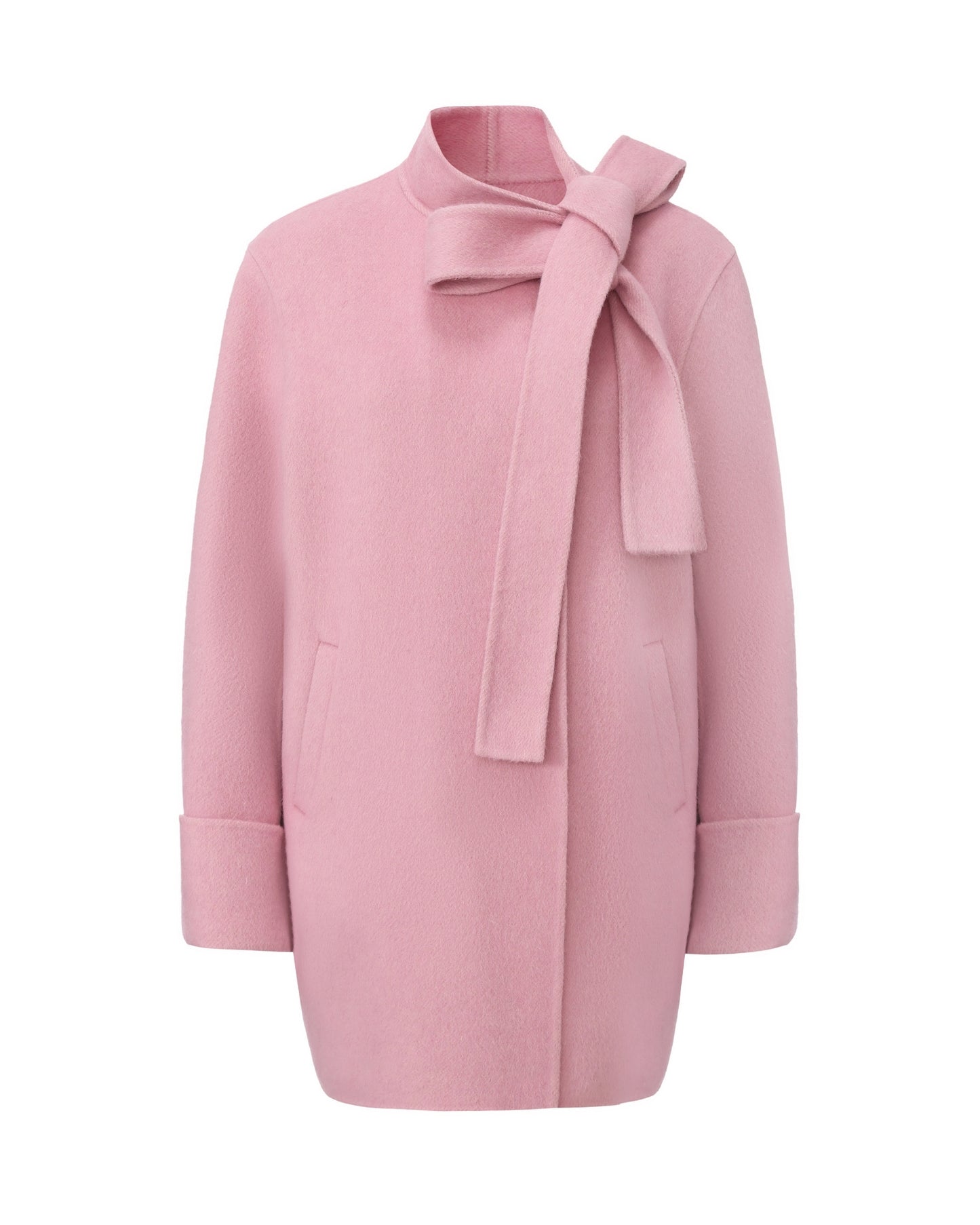 Pink coat with a bow detail on a white background