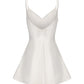 White slip dress on a white background