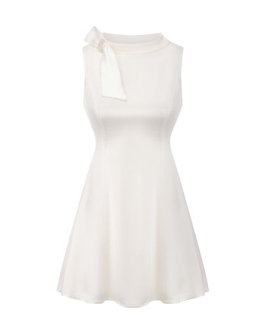 White sleeveless satin mini dress with a bow detail on a white background