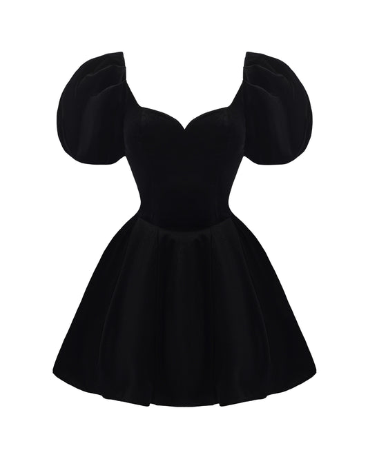 Black velvet mini dress with puffed sleeves on a white background