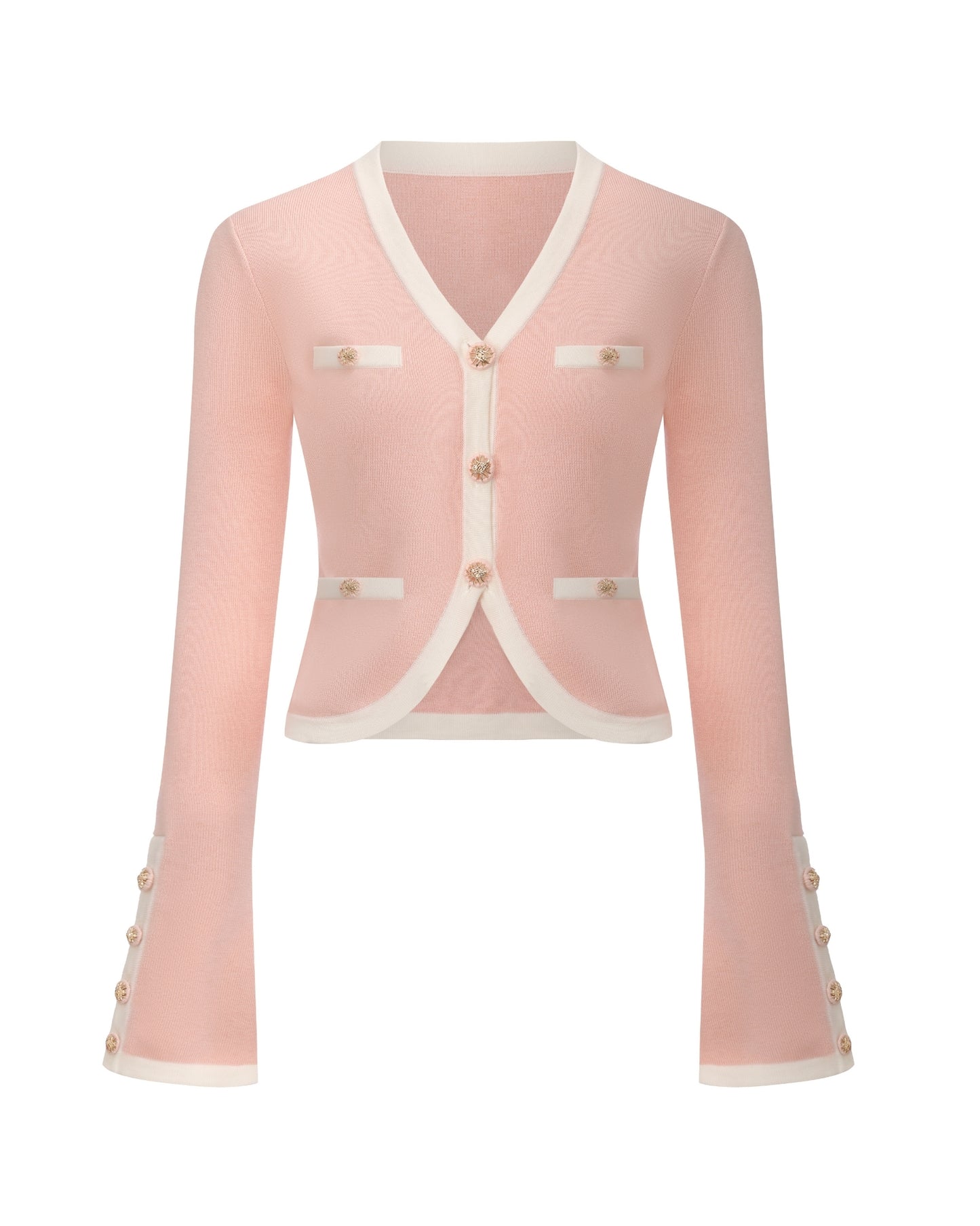 Pink knit cardigan with white trim on a white background