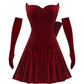 Red velvet mini dress with matching gloves on a white background