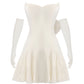 White sleeveless mini dress with long gloves on a white background