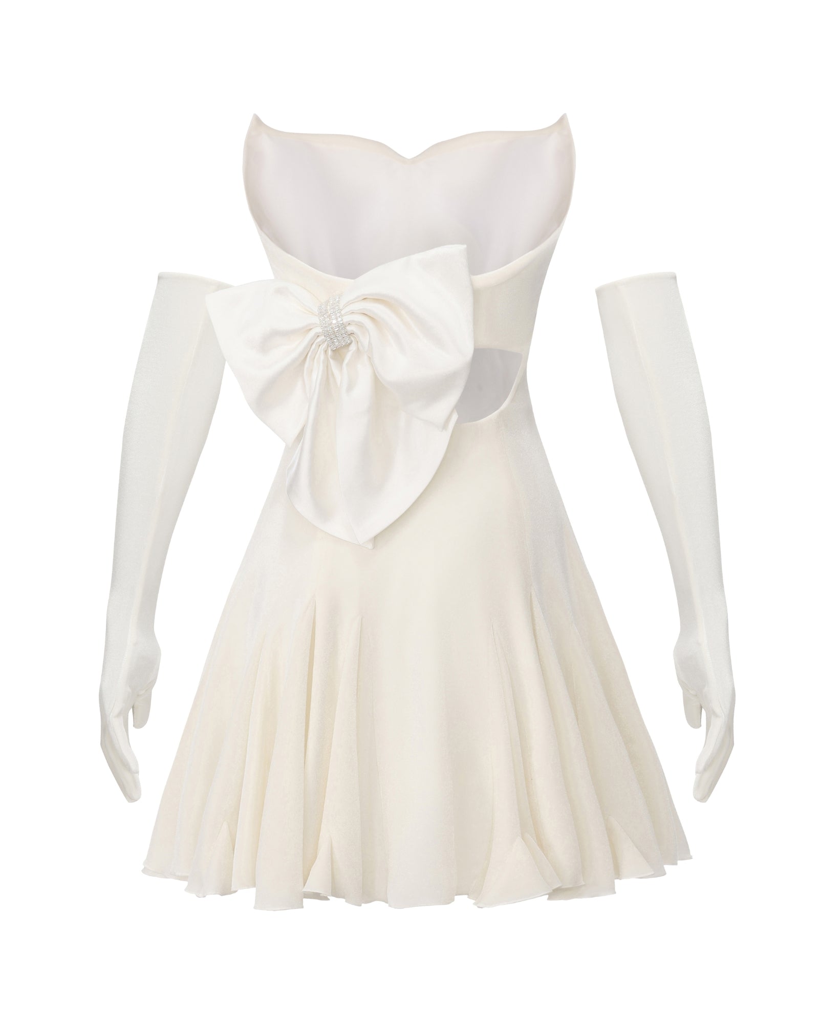 White mini dress with a large bow and matching gloves on a white background