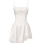 White silk mini dress with lace details on a white background