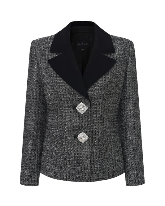 Black and silver jacket with velvet lapel on a white background