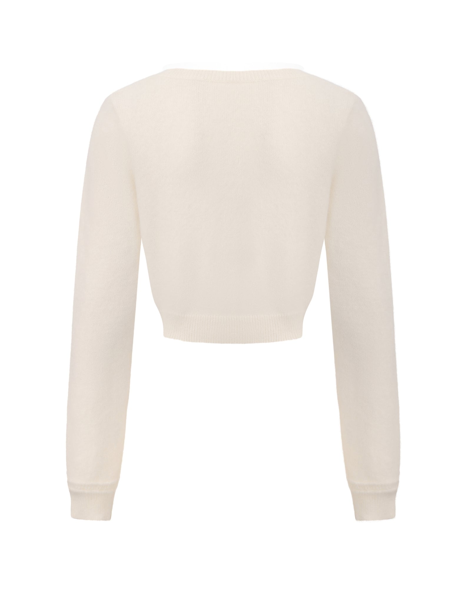 Retro-style white knitted cardigan on  white background