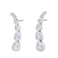 Pair of silver earrings with clear gemstones on a white background