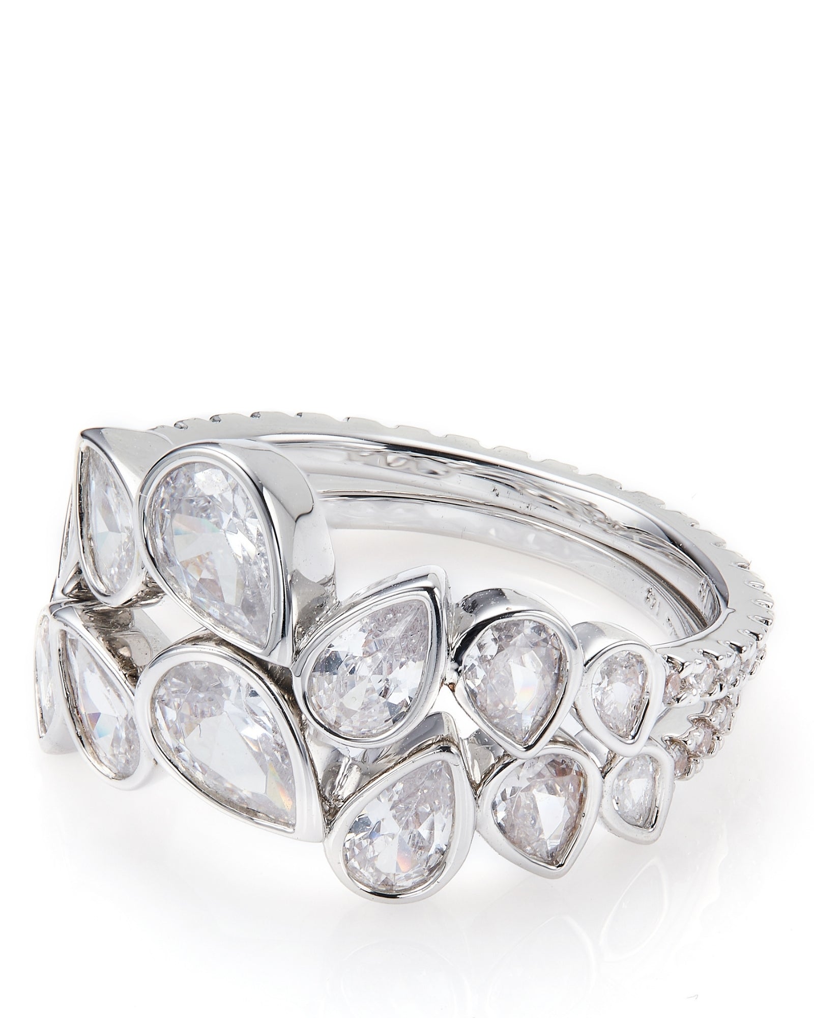 Silver ring with clear teardrop shape gemstones on a white background