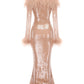 Beige sequin dress with feathered shoulders on a white background