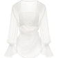 White blouse with ruffled sleeves on a white background