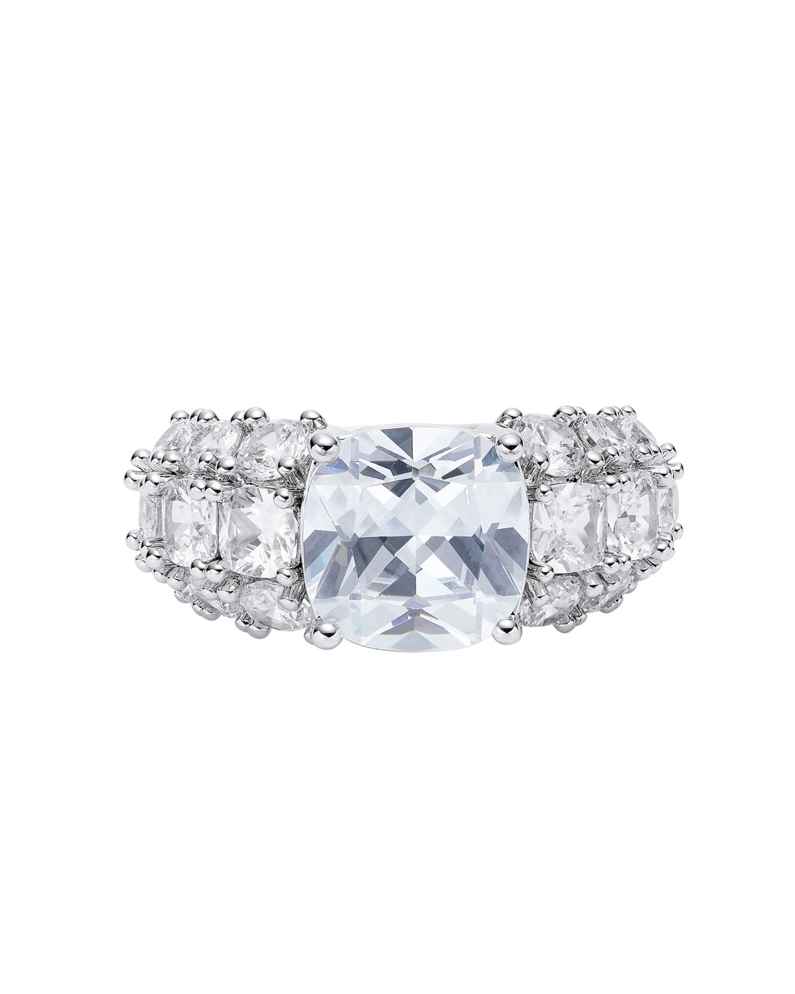 Diamond ring with a central cushion-cut diamond and smaller gemstones on a white background