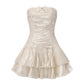 Gold shimmery strapless mini dress with layered skirt on a white background