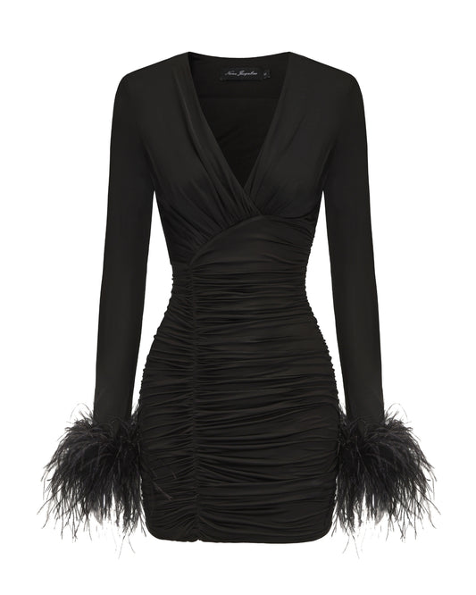 Black dress with feathered cuffs on a white background