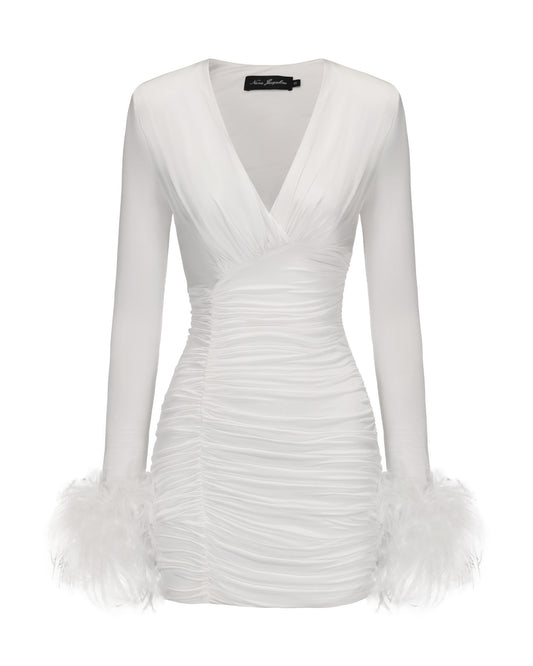 White dress with feathered hem on a white background