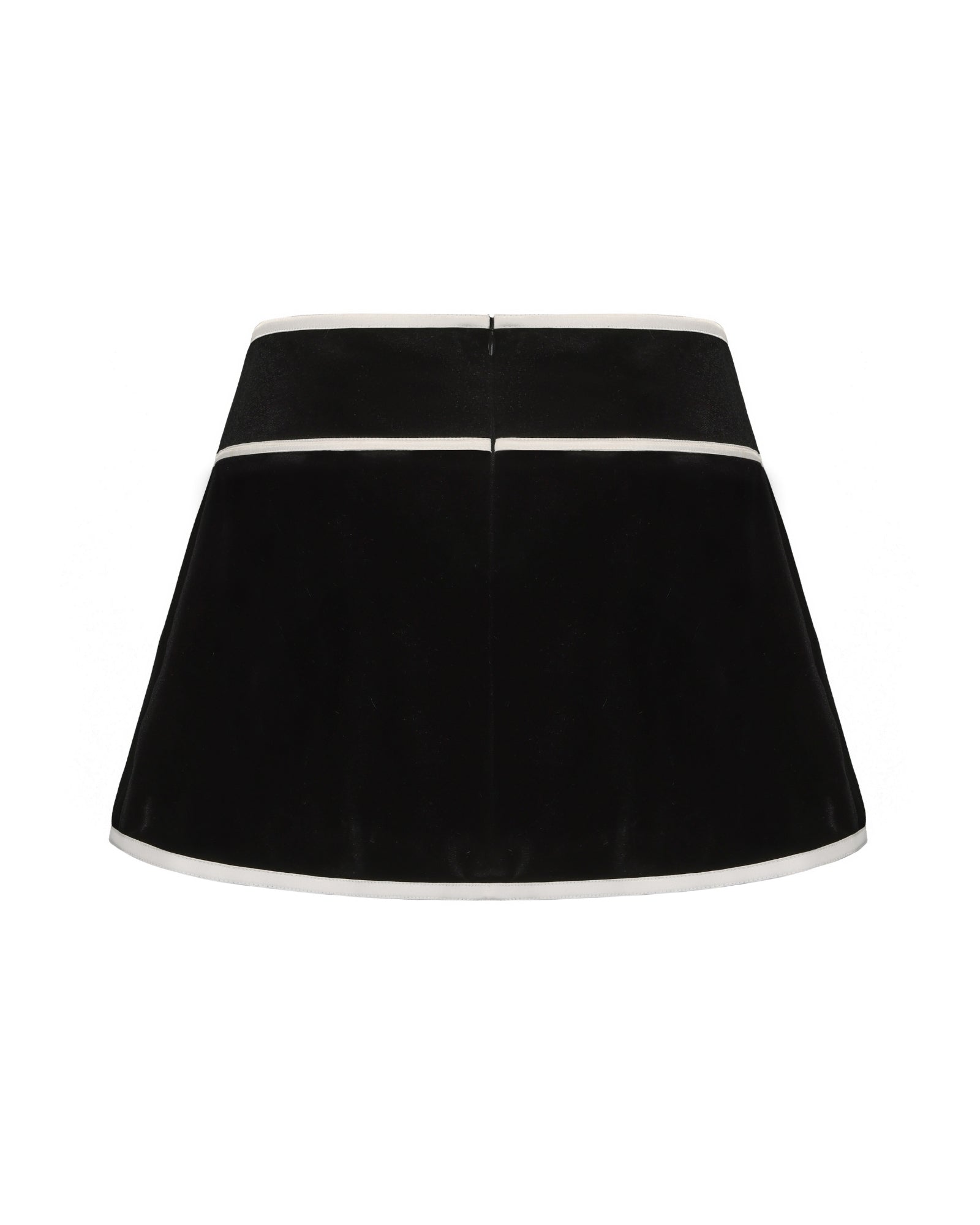 Black velvet skirt with white trim on a white background