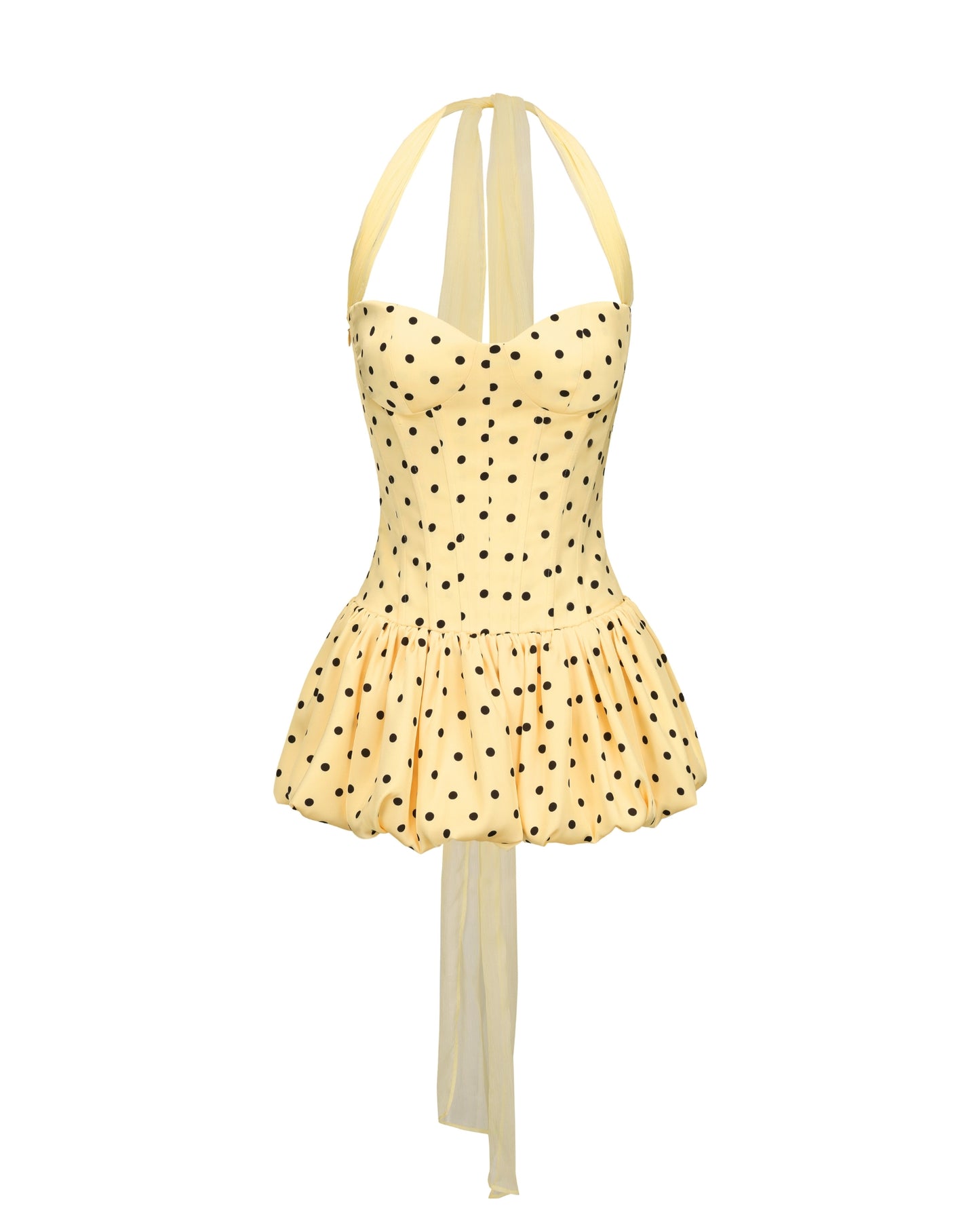 Yellow polka dot mini dress with thin straps on a white background