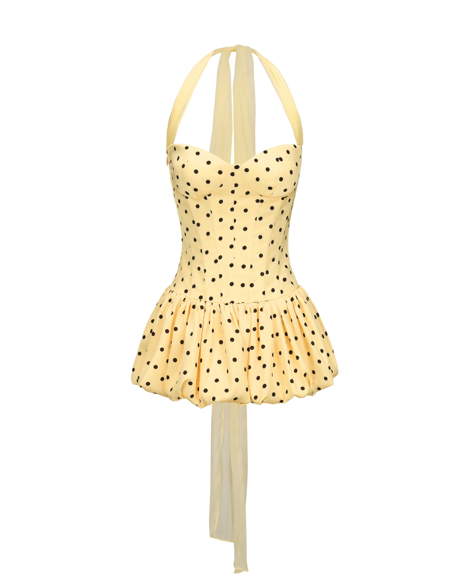 Yellow polka dot mini dress with thin straps on a white background