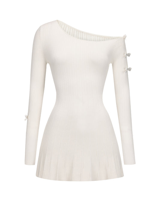 White ribbed knit dress with button details on a white background